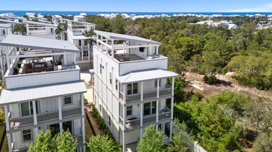There is a certain energy to this stretch of Inlet Beach, where - photo 5