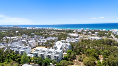 There is a certain energy to this stretch of Inlet Beach, where - photo 9