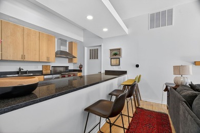 Discover luxury penthouse living in this rare 2-bedroom, 2