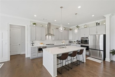 Welcome home to effortless living in one of South Forsyth's most - photo 11