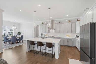 Welcome home to effortless living in one of South Forsyth's most - photo 13