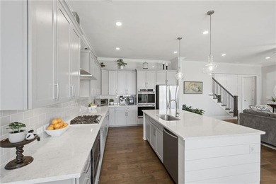 Welcome home to effortless living in one of South Forsyth's most - photo 14