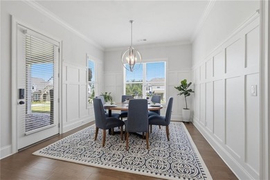 Welcome home to effortless living in one of South Forsyth's most - photo 18