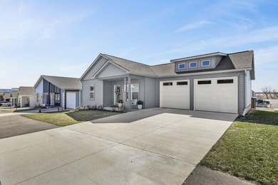 Sunlit, zero-entry living paired with a welcoming front porch - photo 36