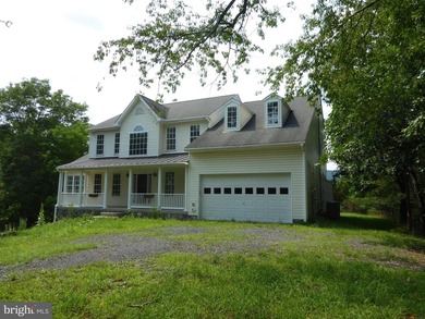 CALL NOW TO SEE THIS COLONIAL HOME WITH LOTS OF PRIVACY AND - photo 1