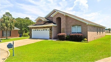Tour this well-maintained 3BR/2BA custom brick home located in