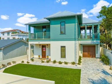 Welcome to your turnkey coastal haven at 322 Sea Breeze Drive, a - photo 1