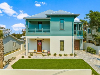 Welcome to your turnkey coastal haven at 322 Sea Breeze Drive, a - photo 4