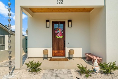 Welcome to your turnkey coastal haven at 322 Sea Breeze Drive, a - photo 6