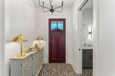 Welcome to your turnkey coastal haven at 322 Sea Breeze Drive, a - photo 7