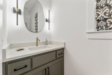 Welcome to your turnkey coastal haven at 322 Sea Breeze Drive, a - photo 8
