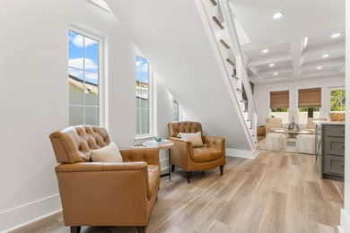 Welcome to your turnkey coastal haven at 322 Sea Breeze Drive, a - photo 9