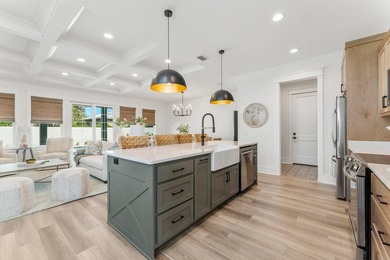 Welcome to your turnkey coastal haven at 322 Sea Breeze Drive, a - photo 10