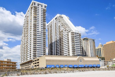 This beautiful condo features stunning views of the beach, ocean