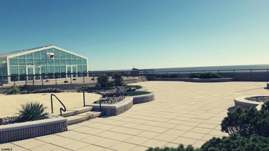 This beautiful condo features stunning views of the beach, ocean