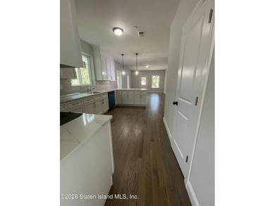 A unique gem! Gorgeous 2 family new construction. This - photo 6