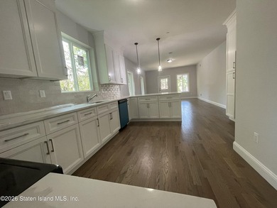 A unique gem! Gorgeous 2 family new construction. This - photo 7