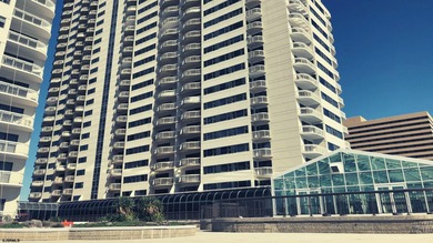 This beautiful condo features stunning views of the beach, ocean