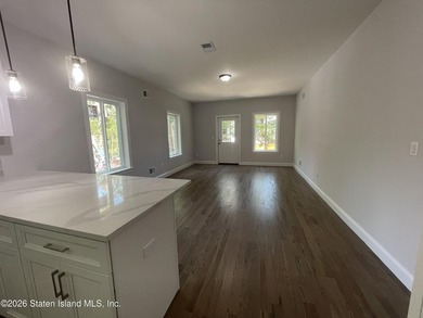 A unique gem! Gorgeous 2 family new construction. This - photo 9