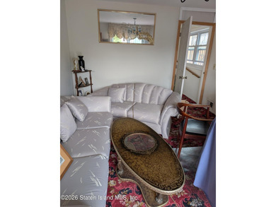Welcome to an exceptional opportunity at 653 Hylan Boulevard, a - photo 4