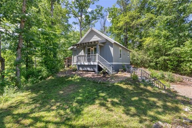 Welcome to Bearfoot Cabin, a charming mountain retreat perched - photo 8