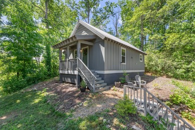 Welcome to Bearfoot Cabin, a charming mountain retreat perched - photo 10