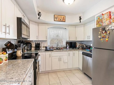Welcome to 4 Cottage Avenue, a fully detached two-family home - photo 7