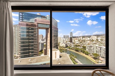 Situated in the heart of Waikiki, this high-floor unit at - photo 3