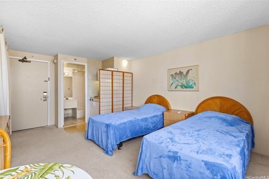 Situated in the heart of Waikiki, this high-floor unit at - photo 5