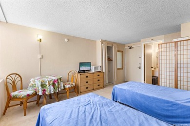 Situated in the heart of Waikiki, this high-floor unit at - photo 7
