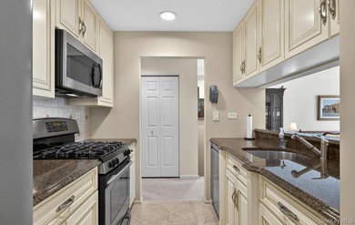 This impeccable Arbor model condominium at Oak Park at - photo 11