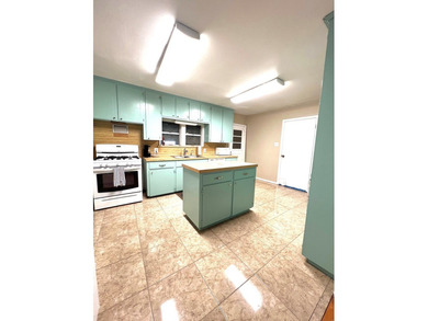 ROOM FOR EVERYTHING! This charming 2-bedroom, 1-bath home sits - photo 12