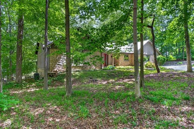 Rare opportunity on Morse Lake with 1.4 wooded acres - a setting - photo 5