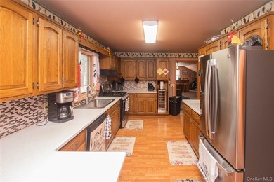This well-maintained 3-bedroom, 1.5-bath split-level home offers - photo 21