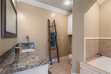 Timeless Southern elegance meets modern comfort in this - photo 27