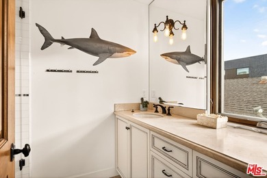 Just two homes in from the sand, this inviting home offers an - photo 34