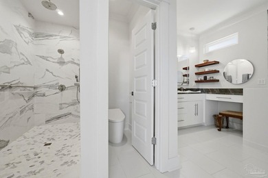 Built in 2023, this custom 5BR, 5.5BA Gulf-front residence - photo 43