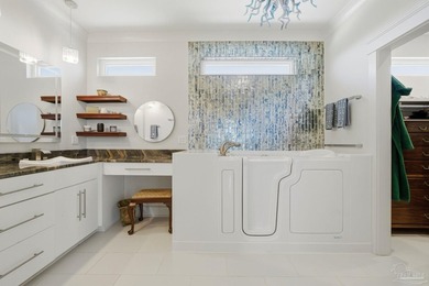 Built in 2023, this custom 5BR, 5.5BA Gulf-front residence - photo 44