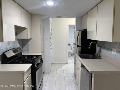 FABULOUS LUXURY LIVING, HI-RISE CONDO FEATURES- CERAMIC TILE - photo 7