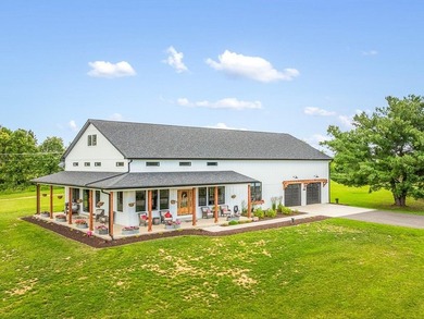 Only two years new and move-in ready, this custom-built ranch - photo 2