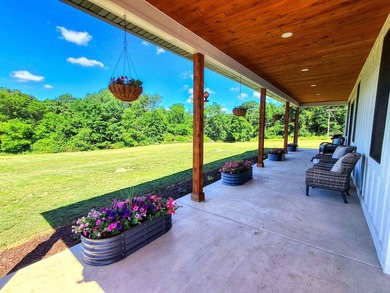 Only two years new and move-in ready, this custom-built ranch - photo 5