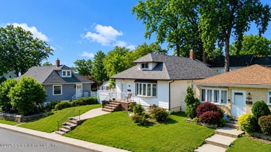 Welcome to 106 Hillcrest Avenue, a single-family detached raised - photo 2