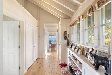 Set on an oversized bayfront parcel with sweeping views to - photo 11
