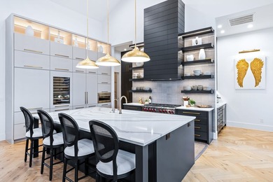 This custom-designed architectural showpiece offers 4,100 sq ft - photo 12