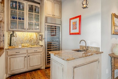 Exceptional lakefront living begins with a striking stone - photo 12