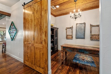 Exceptional lakefront living begins with a striking stone - photo 13