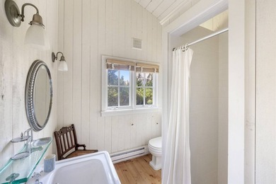 Set on an oversized bayfront parcel with sweeping views to - photo 13