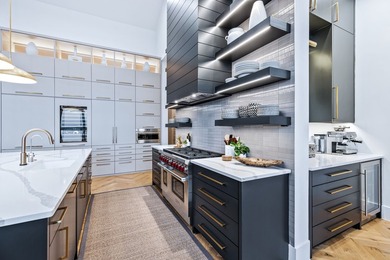 This custom-designed architectural showpiece offers 4,100 sq ft - photo 14