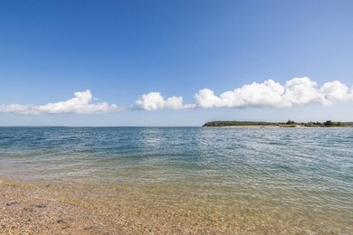 Set on an oversized bayfront parcel with sweeping views to - photo 17