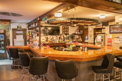 Discover *The Wagon Wheel,* a beloved bar and restaurant located - photo 25